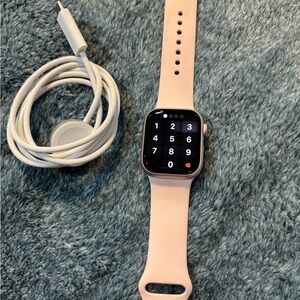 Apple Smartwatch with Light Pink Band and Charger